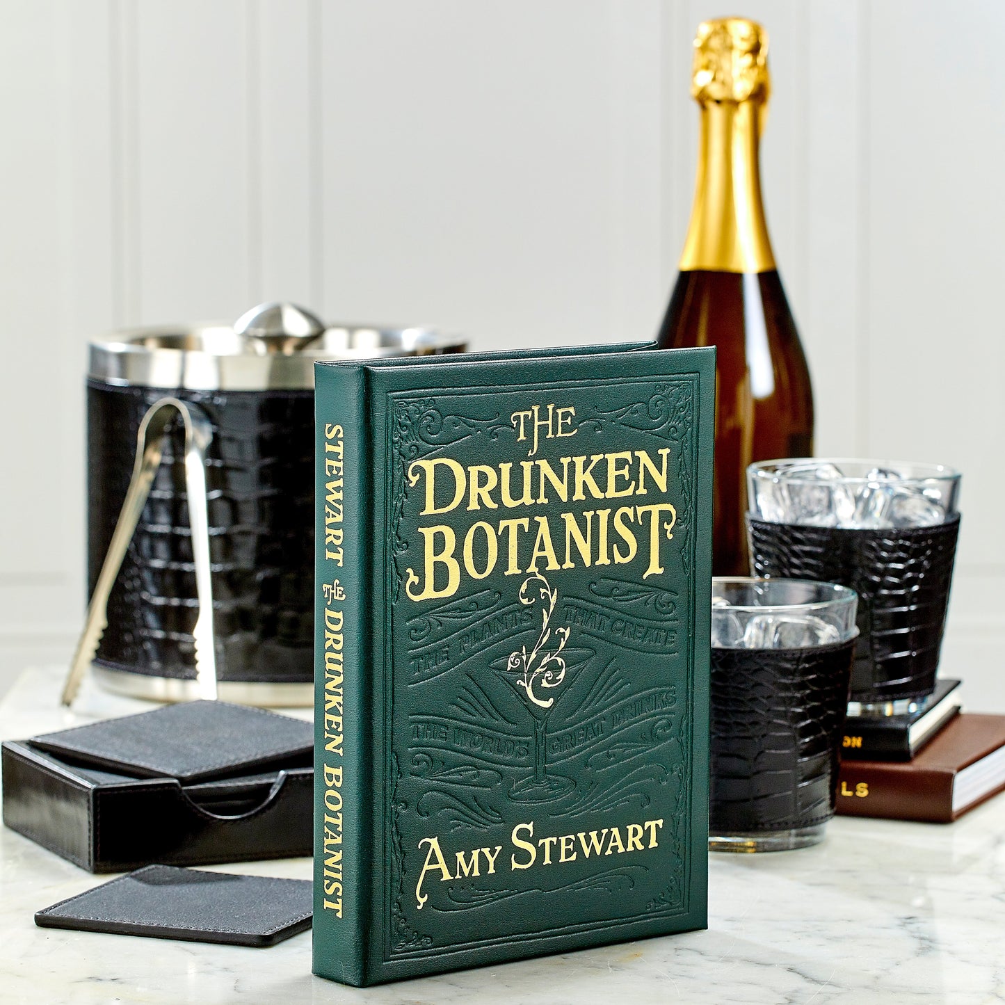 The Drunken Botanist book on a bar
