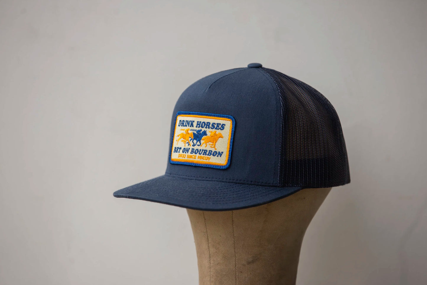 Drink Horses Bet on Bourbon Trucker Hat Navy