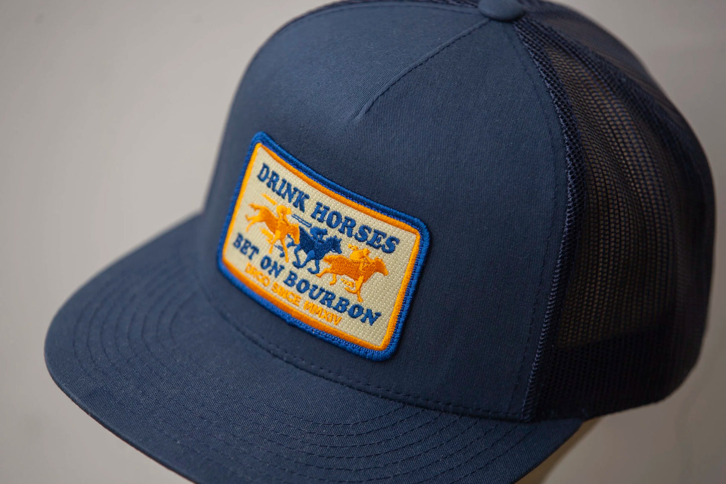 Drink Horses Bet on Bourbon Trucker Hat Navy