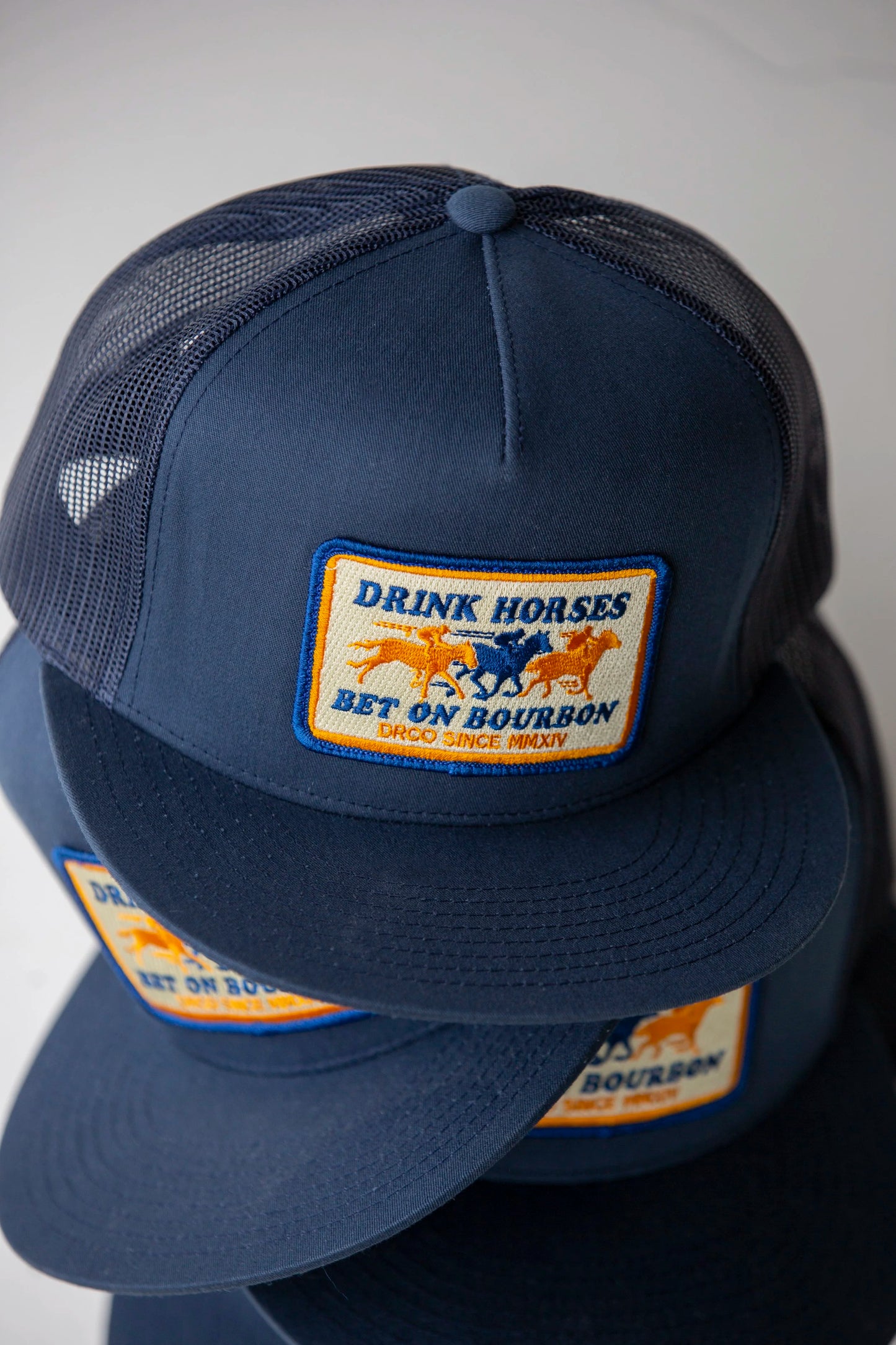 Drink Horses Bet on Bourbon Trucker Hat Navy