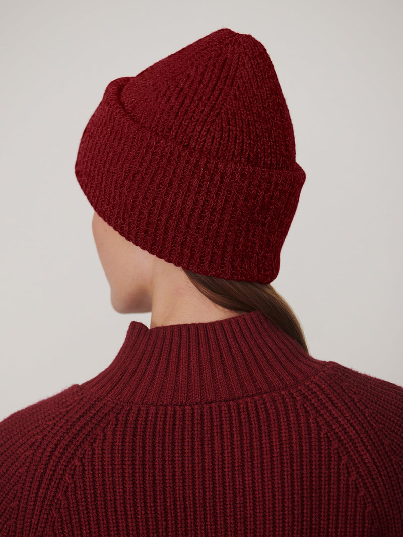 Carly Knit Beanie 2.0 in Rumba Rose on model
