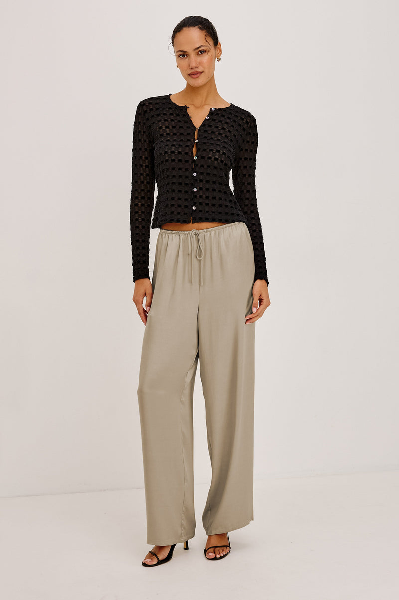 Cyrah Top in Black Checkerboard lace, full length view on model