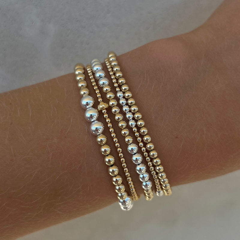 2MM Signature Bracelet with 14K Gold Rondelle Pattern