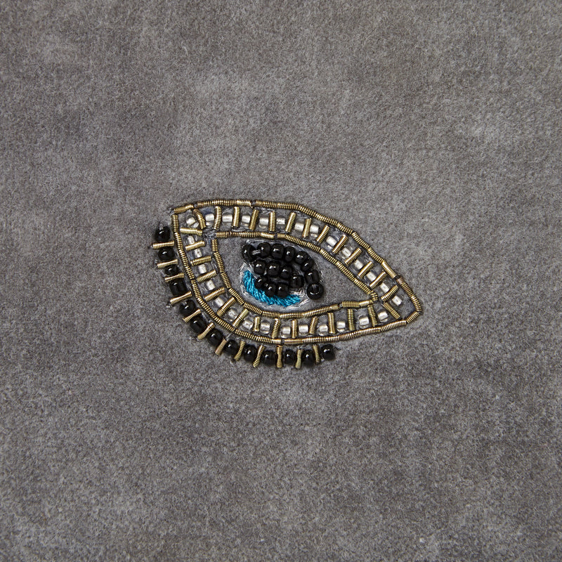 Embroidered evil eye pillow, grey cotton velvet