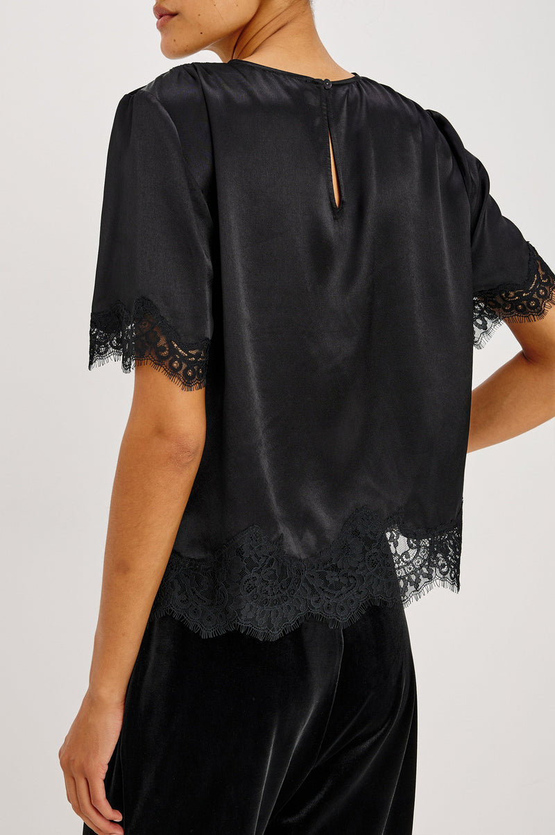 Sonora Top in Black satin, back view on model